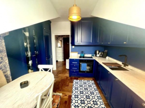 Central, top floor apartment